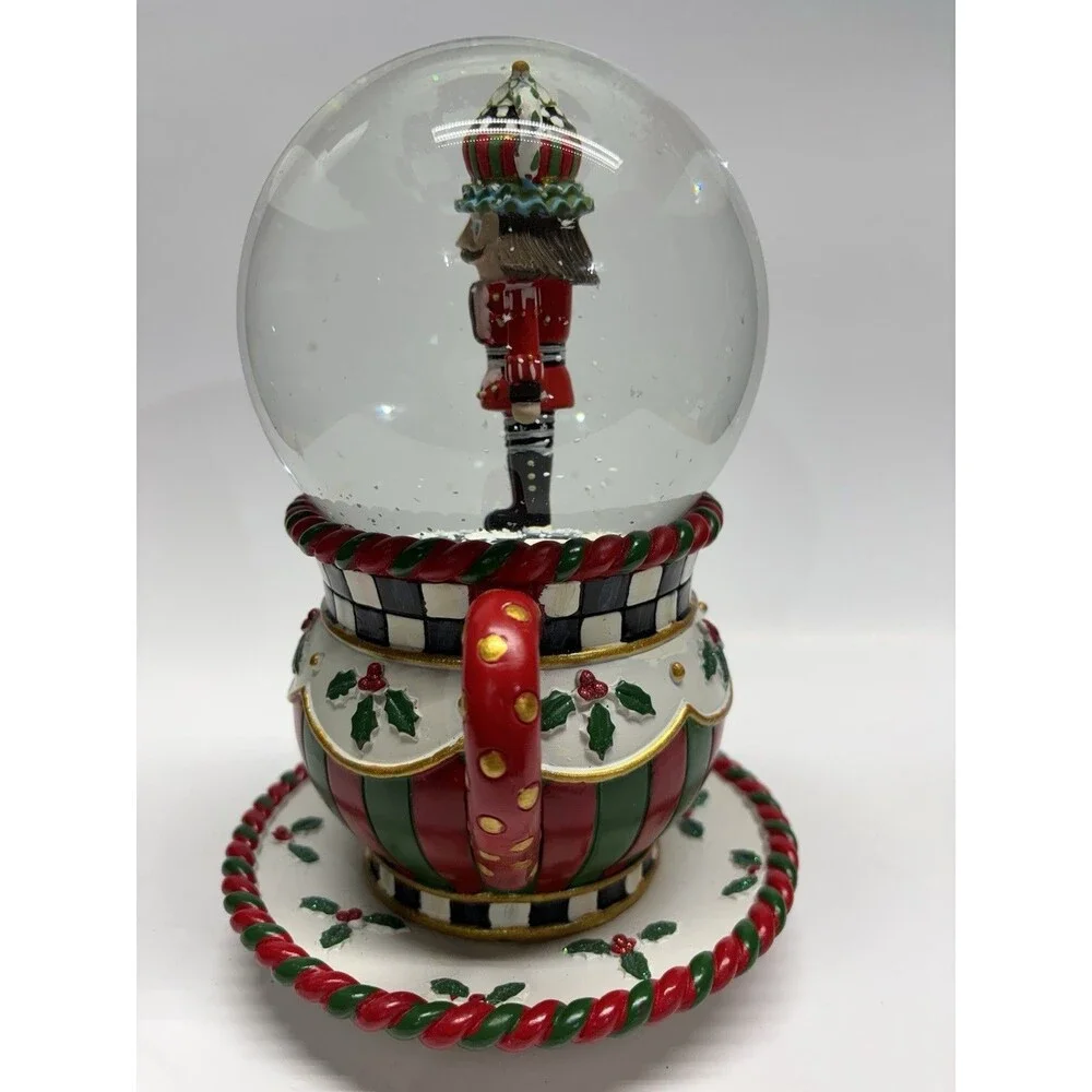 MacKenzie Childs Christmas Snow Globe Musical Tea Cup Nutcracker 8 1/2" Tall - Picture 2 of 8